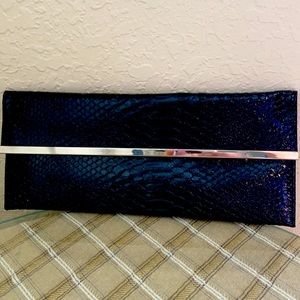 Black snake skin print clutch with silver chain